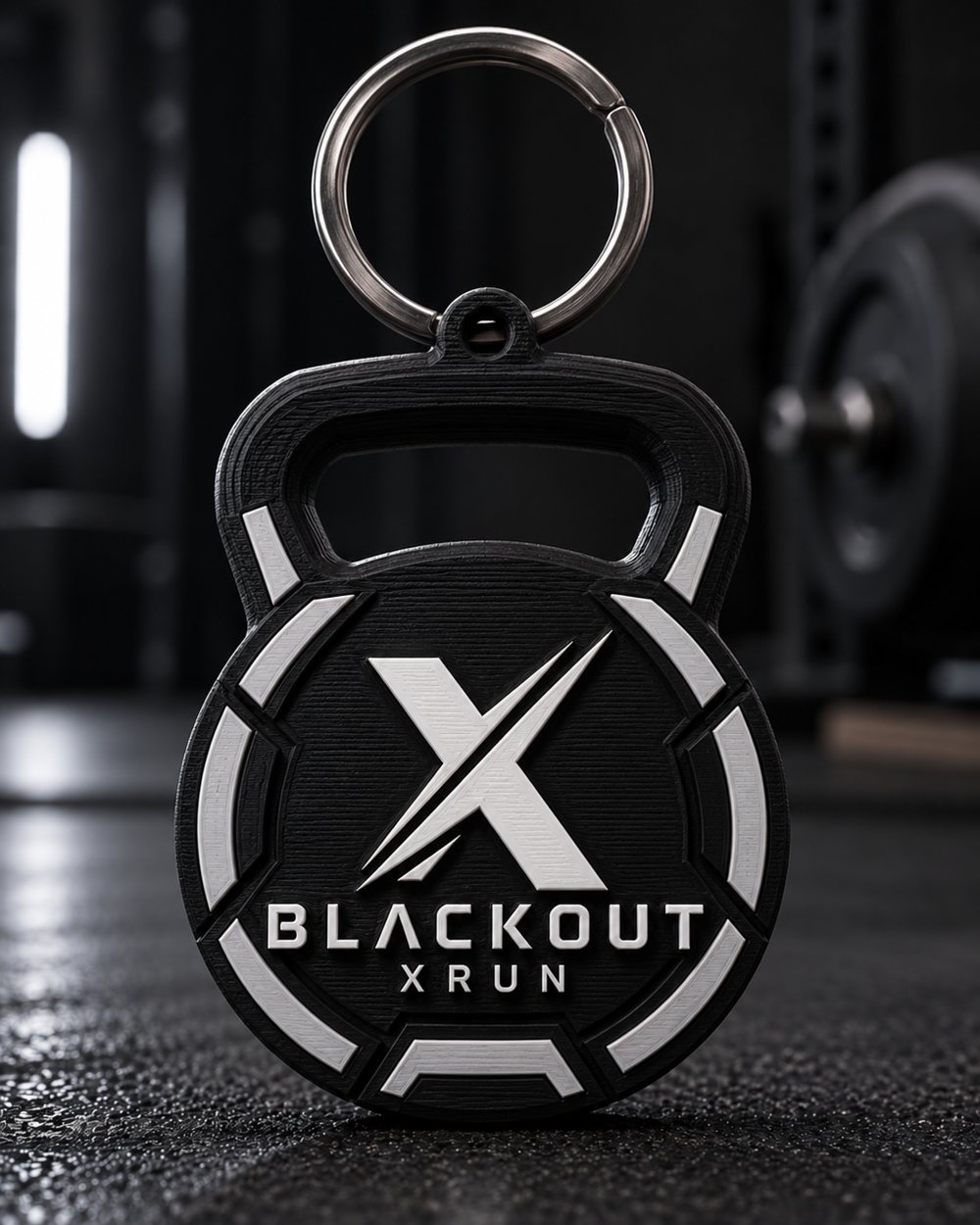 Chaveiro em formato de kettlebell com a marca Blackout X Run